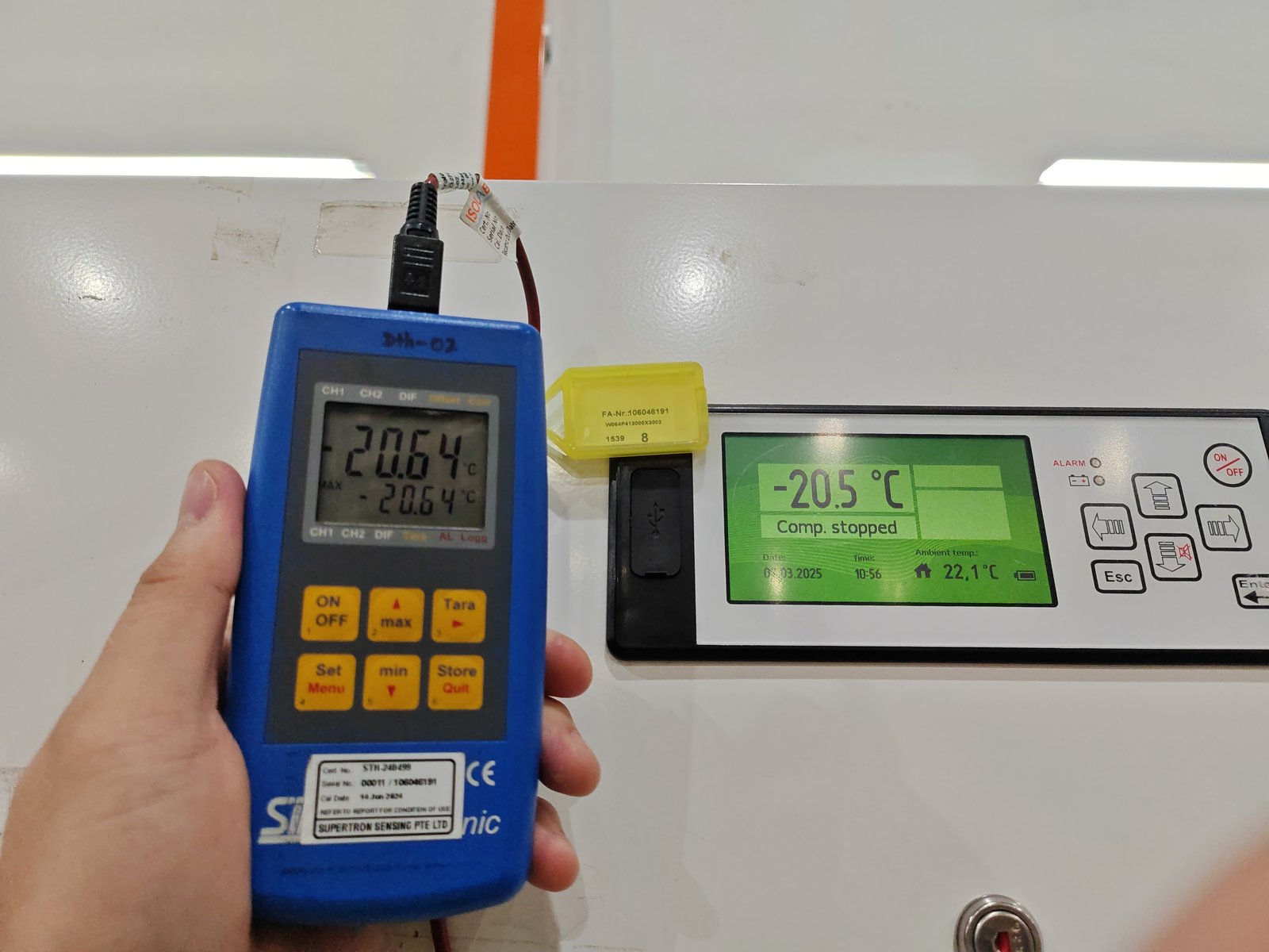 Freezer calibration against a reference thermometer